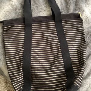 Black and gold striped Bath and Body Works tote